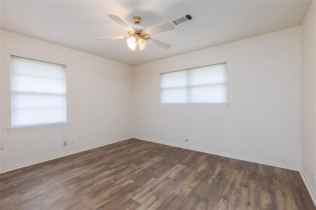 3rd Bedroom has wood laminate flooring and two large windows to let in the natural Sunlight | Image 20