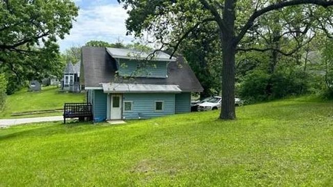 Back of house with a lawn | Image 24