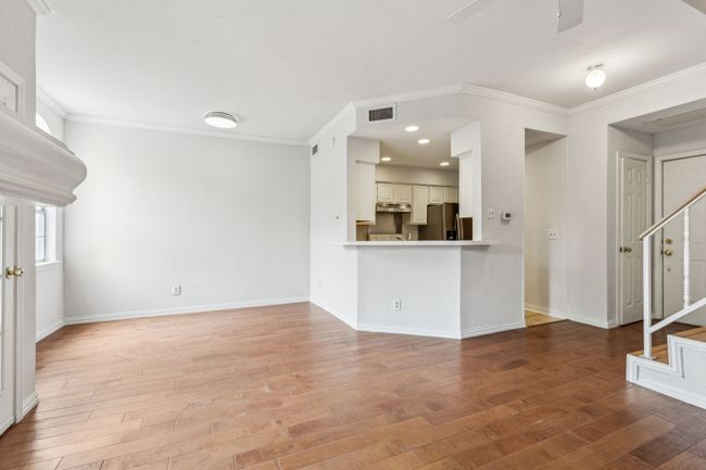 Open floor plan, fresh paint and wood flooring | Image 14