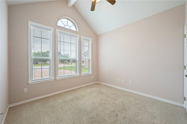 Unfurnished room featuring a ceiling fan, carpet, and baseboards | Image 12