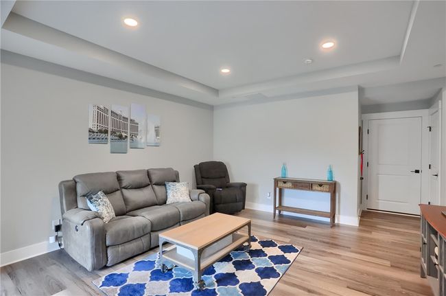 Hall bath features custom lighting and amenities and a deep soaking tub/shower combo! | Image 43