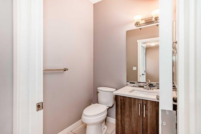 23 Baysprings Way Sw, Home with 3 bedrooms, 3 bathrooms and 1 parking in Airdrie AB | Image 22