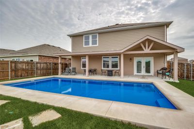 Oasis backyard with 30 x 15 swimming pool and room for play! | Image 1