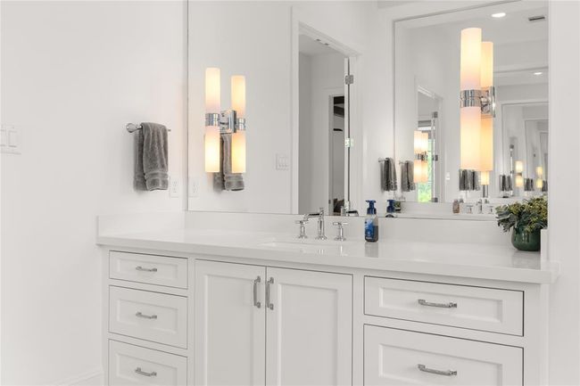 Another vanity in the primary bath with plenty of counter space & storage. | Image 34