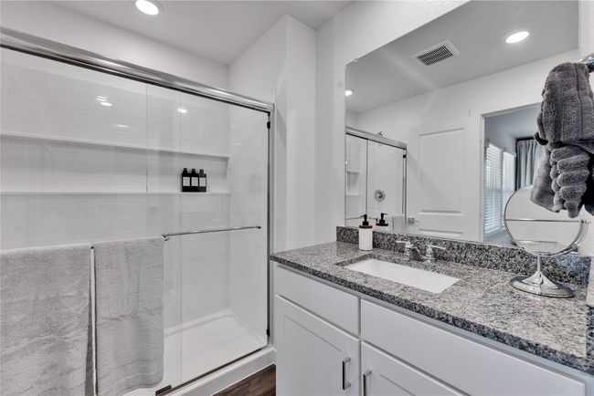Full bathroom featuring recessed lighting, visible vents, a shower stall, and vanity | Image 20