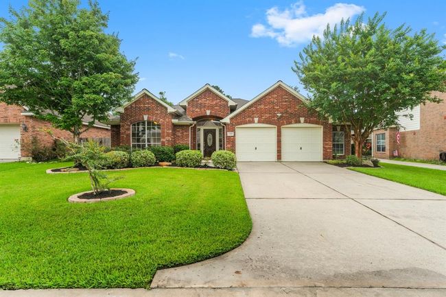 Showcasing a gorgeous brick front elevation and meticulously maintained landscaping, this beautiful home exudes curb appeal from the moment you arrive. Inside, you'll find 3 bedrooms, 2 baths, a private study, formal dining, sunroom, and a versatile extra room connected to the primary suite that is perfect for a work station, exercise space, hobbies, or quiet retreat. | Image 39