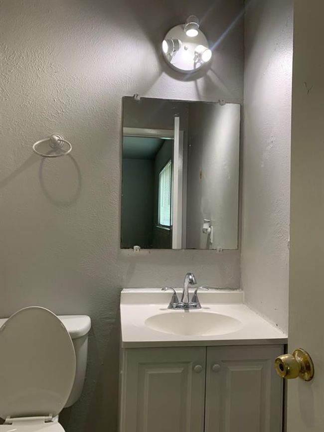 Bathroom with vanity and toilet | Image 11