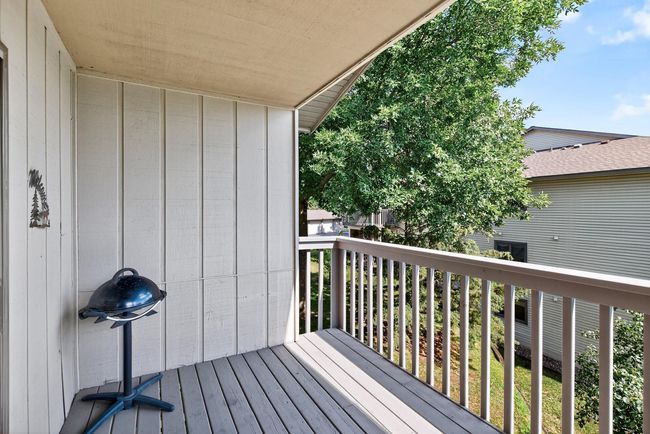 Enjoy this spacious deck in the warmer months. Fill it up with your favorite flowers and a herb garden. The deck was completely refinished in 2024. | Image 19