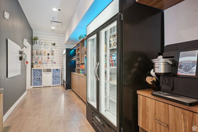 Corridor with recessed lighting and light wood finished floors | Image 40