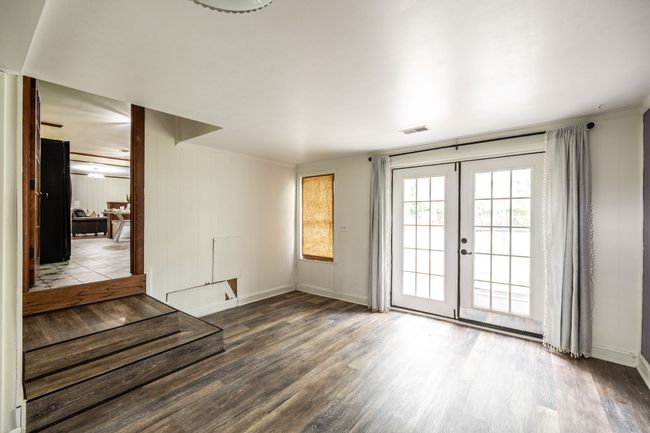 Off the other end of the kitchen is another flex space. | Image 40