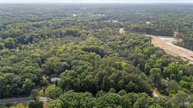 Bird's eye view of a heavily wooded area | Image 41