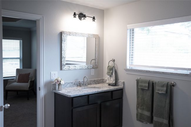 Bathroom featuring vanity and a healthy amount of sunlight | Image 15