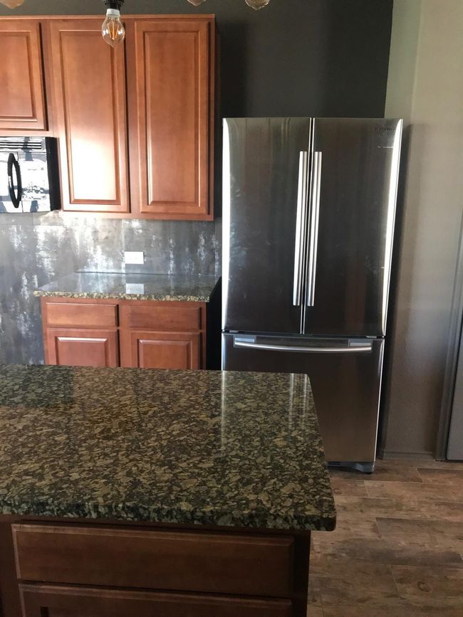 Stainless refrigerator included in lease. | Image 14