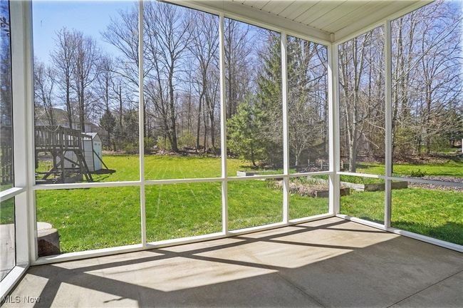 View of unfurnished sunroom | Image 36