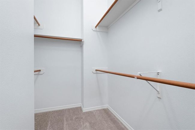 This unit has plenty of storage. This large walk in closet is in the primary bathroom. | Image 23