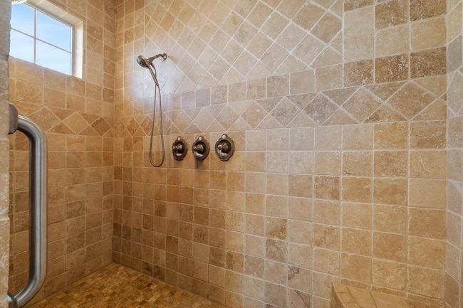 Full bathroom featuring a tile shower | Image 21