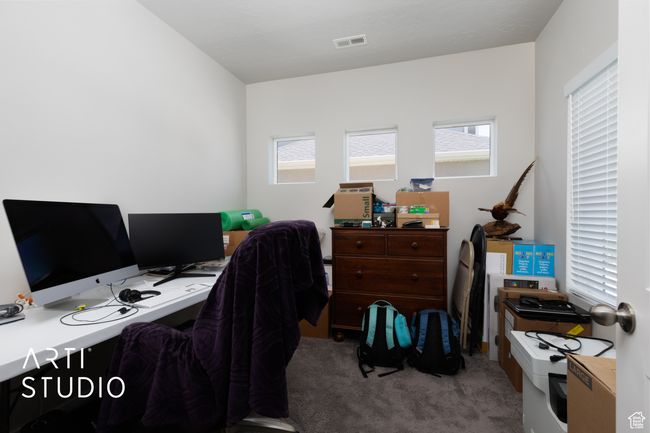 Carpeted home office with healthy amount of natural light | Image 5