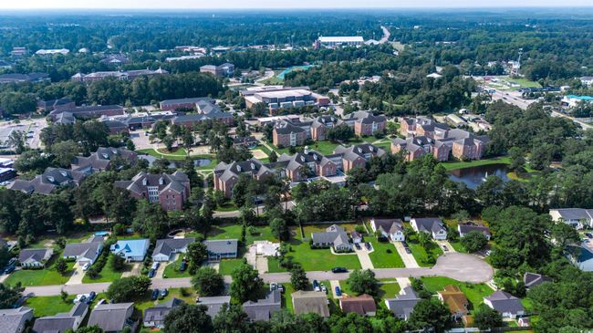 Aerial view of property and surrounding area with nearby suburban area | Image 11