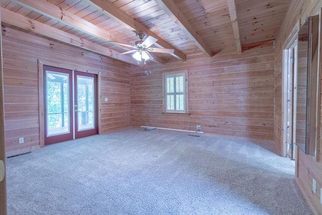 Primary Bedroom Opens to Screened Porch | Image 24