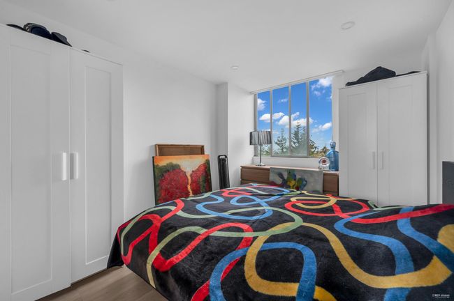 Bedroom with wood finished floors | Image 22