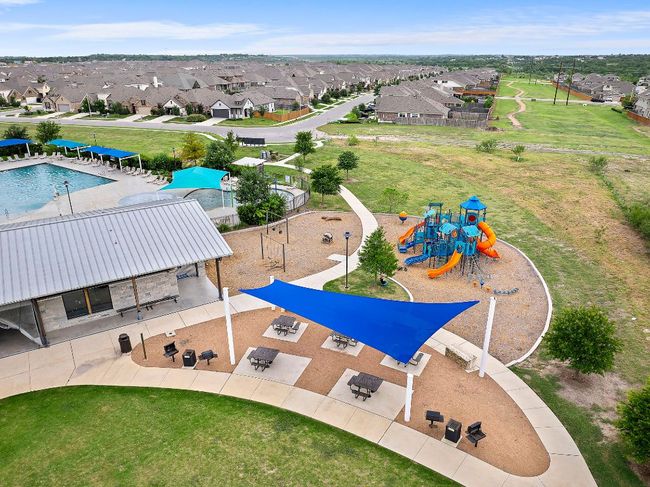 The neighborhood playground offers a fun and safe space for little ones to explore and play. | Image 28