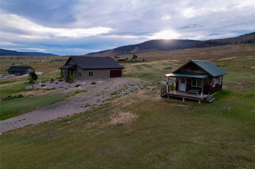 25421 Three Moon Dr, Elmo, MT, 59915-7736 | Card Image