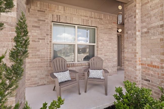 View of patio with a covered porch | Image 9