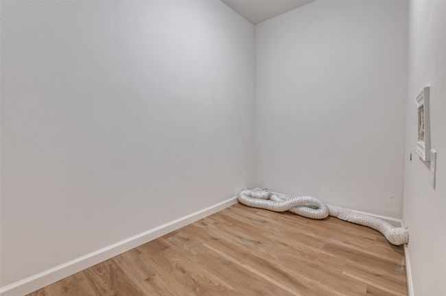 Unfurnished room with light wood-type flooring and baseboards | Image 20