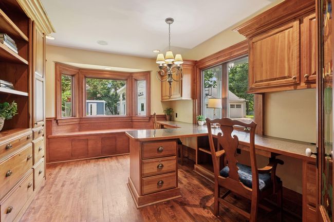 Cherry cabinets in office with built in bookcase | Image 24