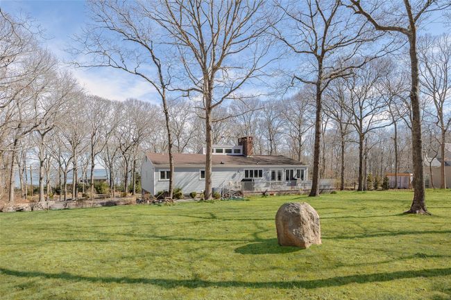 View of front of home featuring a front lawn and a chimney | Image 34