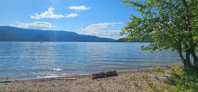 Water view featuring a mountain backdrop | Image 26