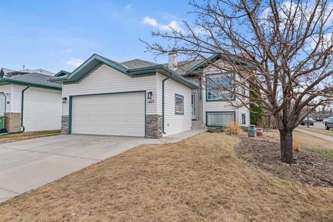 1407 Thorburn Drive Se, Home with 4 bedrooms, 3 bathrooms and 4 parking in Airdrie AB | Image 36