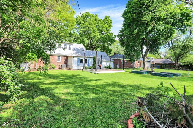 view of yard with a garden and central AC | Image 45