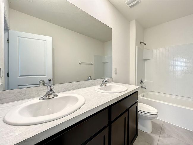 10556 Penny Gale Loop, House other with 5 bedrooms, 4 bathrooms and null parking in SAN ANTONIO FL | Image 37