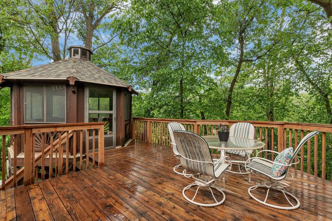 Upper level deck off the dining area, leading out to the gazebo | Image 44
