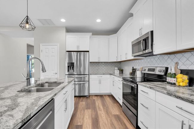 3057 Riders Pass, House other with 4 bedrooms, 3 bathrooms and null parking in ODESSA FL | Image 7