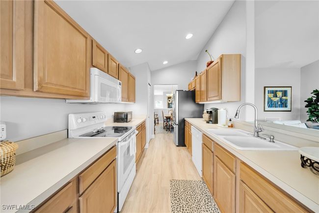 Kitchen with enormous Lake view | Image 10