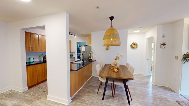 Dining space with baseboards | Image 8