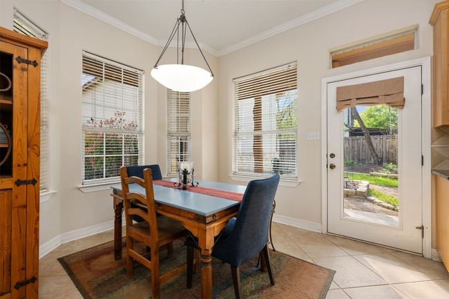 The dining area is so light and bright. | Image 9