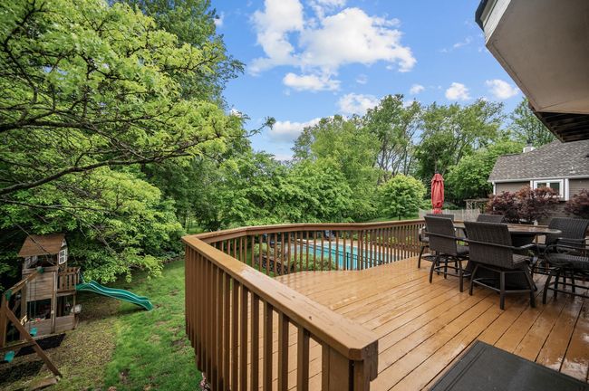 Step onto the deck & into your own private paradise — surrounded by lush landscaping & tranquility. | Image 14