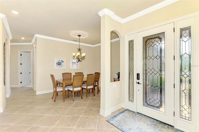 View of Dining Room with Crown Molding from Entrance Foyer | Image 15