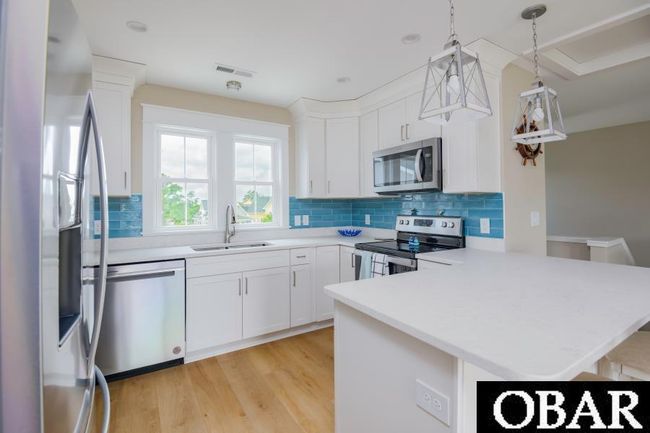 D - 105 Colington Point Cir, Townhouse with 3 bedrooms, 4 bathrooms and null parking in Kill Devil Hills NC | Image 4