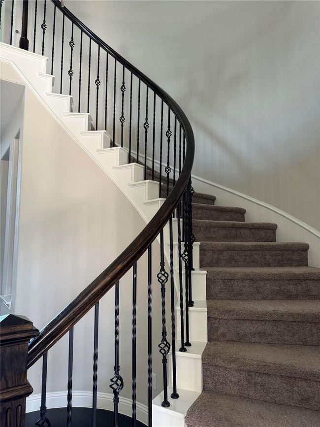 Stairs featuring baseboards | Image 23