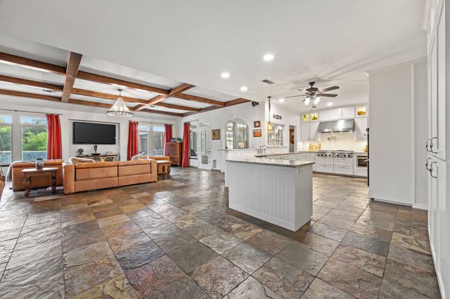 View of Living Room and Kitchen with Views of the Pool Through the Windows | Image 9