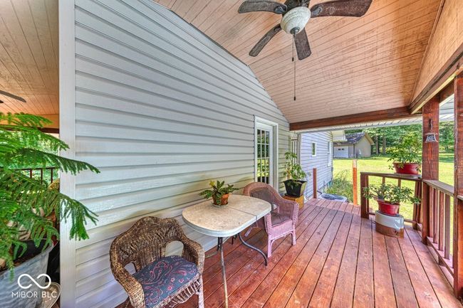 deck featuring ceiling fan | Image 57