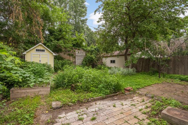 Storage shed and private backyard | Image 24