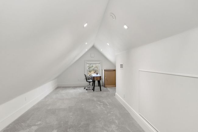 Additional living space with light carpet and lofted ceiling | Image 40