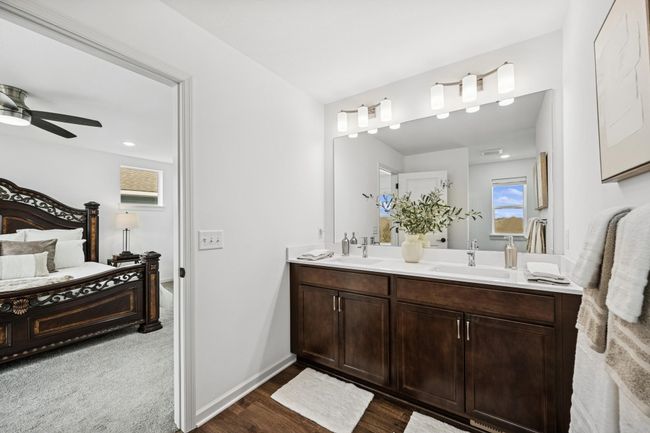 The primary bath and walk in closet are right off the bedroom area. | Image 21