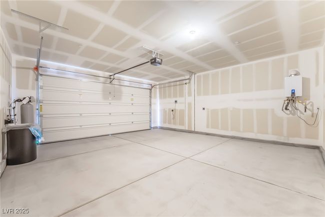 Garage featuring a garage door opener | Image 39