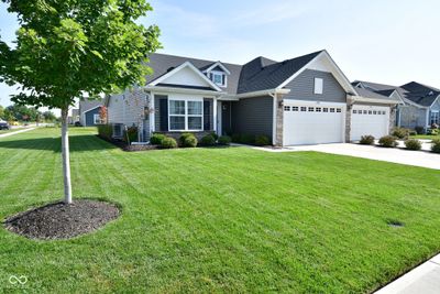 Premium corner lot and extra space in the backyard provides a tranquil view from every room. Bonus. 2 car attached garage | Image 2